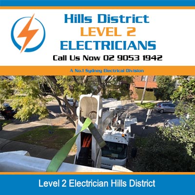 Level 2 electrician's service vehicle parked in residential driveway in Hills District